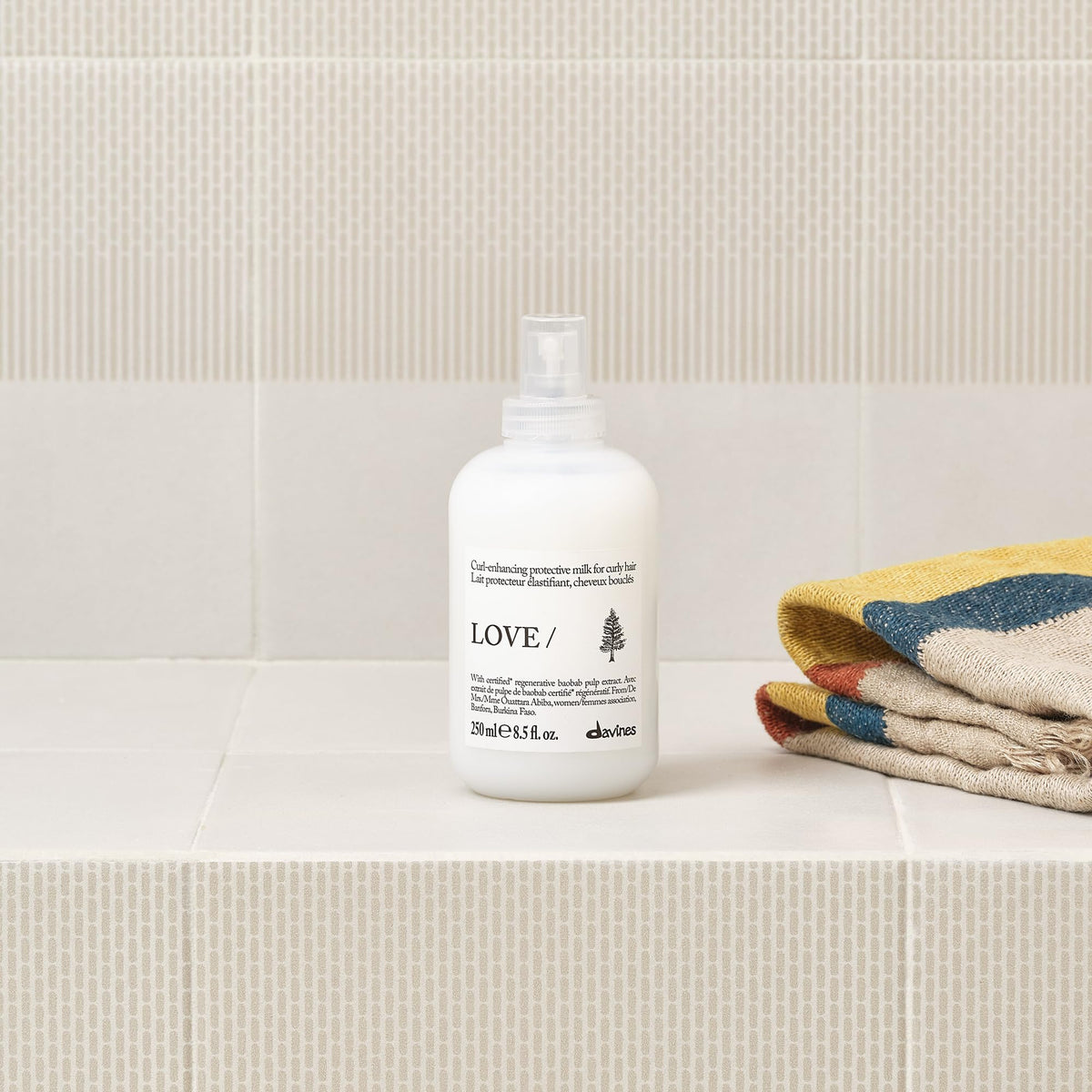 Davines product in hand demonstrating easy application and control