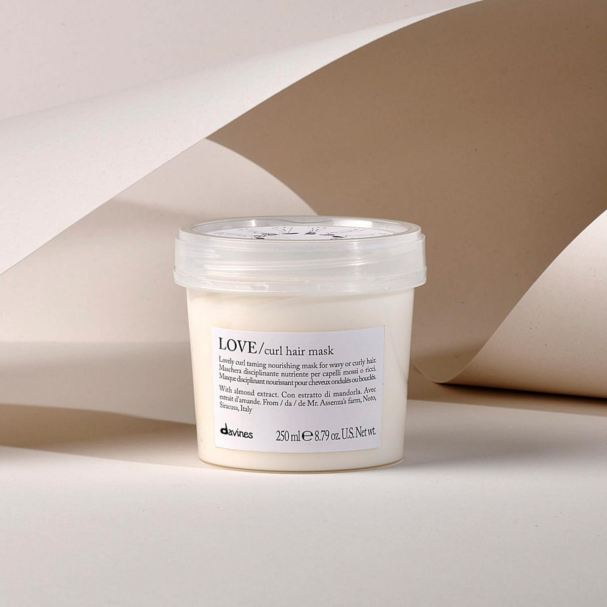 Davines LOVE/curl open jar cream texture demonstrating rich nourishing slip