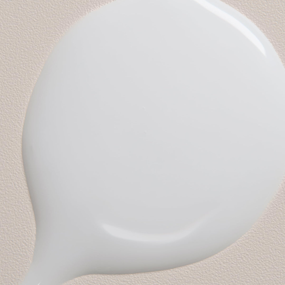 Davines bottle next to everyday items showing 8.5 fl oz scale