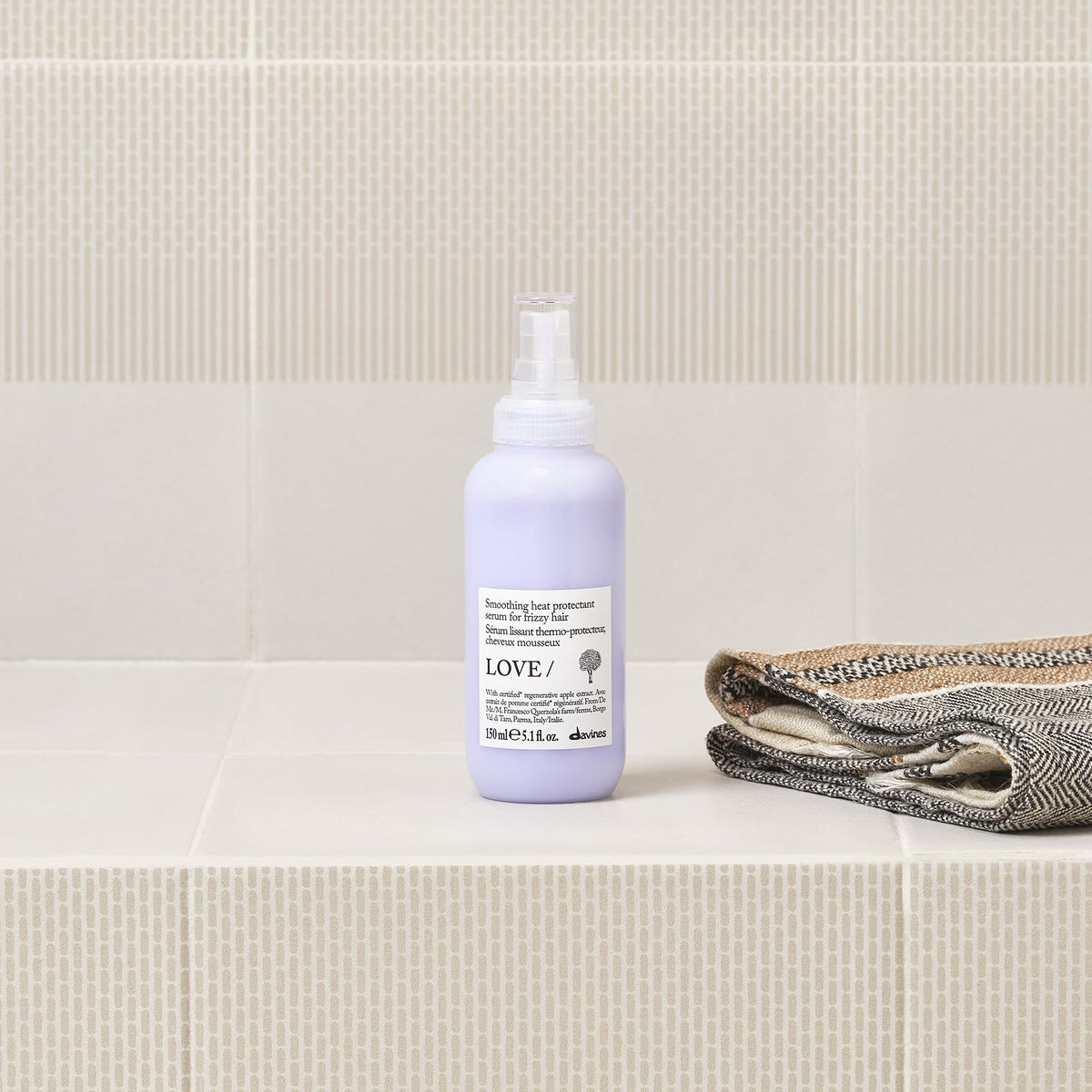Davines being applied to damp hair improving detangling and manageability
