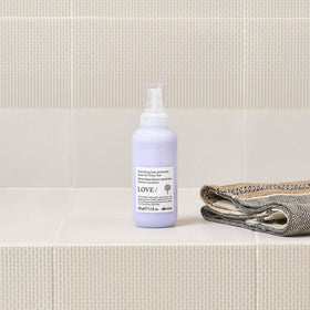 Davines being applied to damp hair improving detangling and manageability