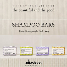 Davines LOVE SMOOTHING bar in hand demonstrating easy grip and travel convenience