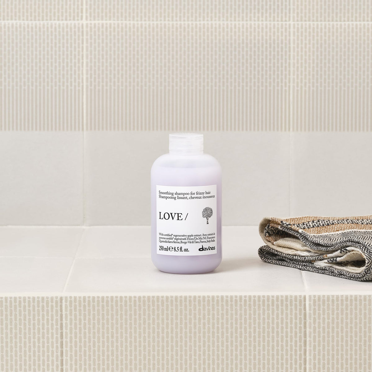 Davines LOVE SMOOTHING pump dispensing product for easy control and less waste