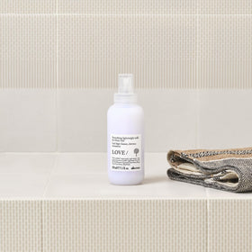 Davines spray applied to damp hair demonstrating easier styling and protection