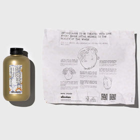 Davines medium hold gel texture in open jar highlighting smooth consistency