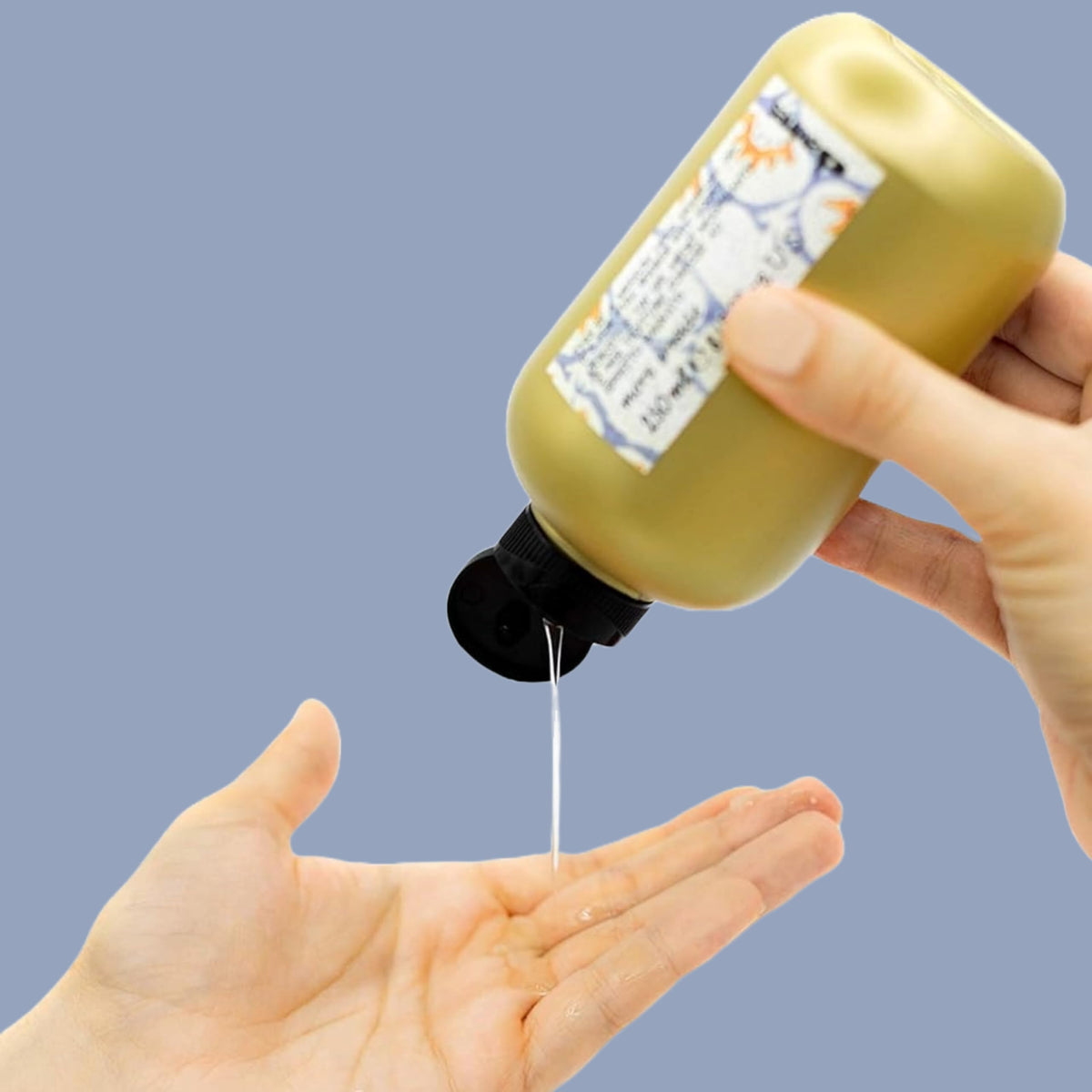 Davines medium hold gel being dispensed emphasizing easy application