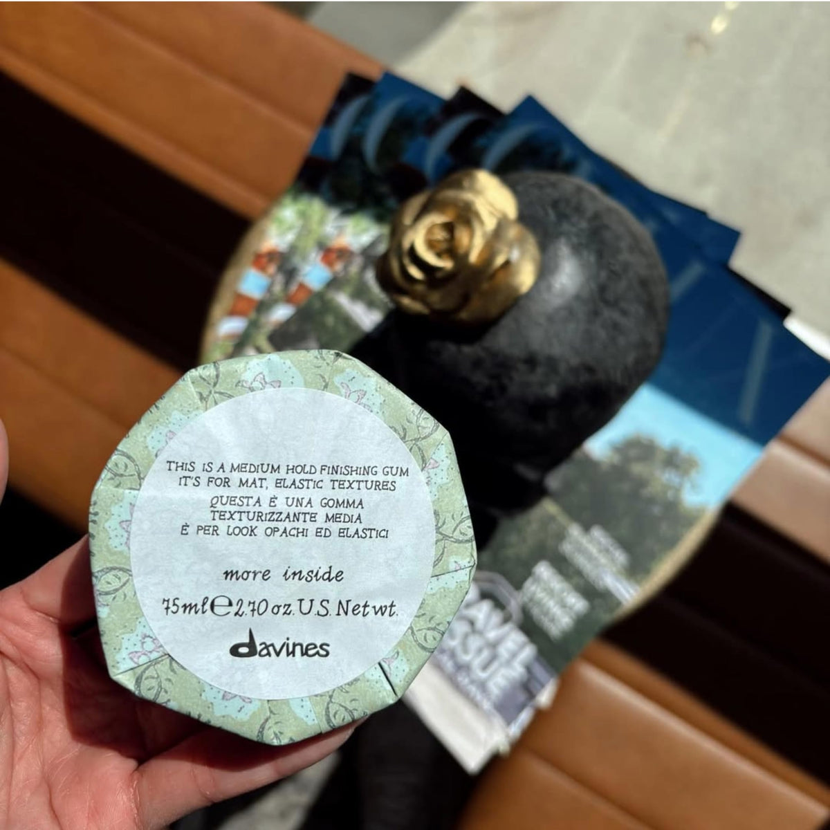 Davines label close-up showing ingredient details and sustainable branding
