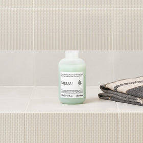 Davines MELU/ applied to long hair lengths showing even coverage