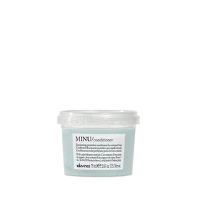 Davines MINU front packaging shows travel-size bottle and brand clarity, promotes portability