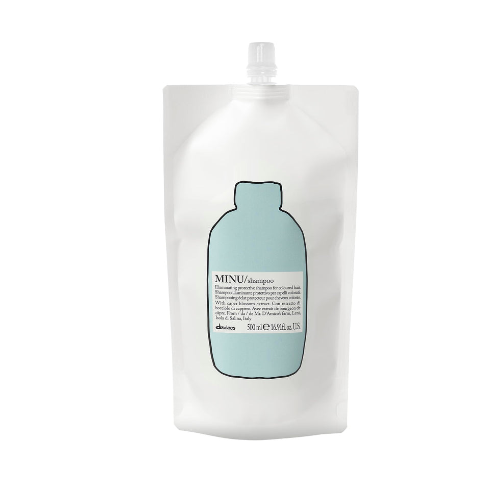 Davines MINU shampoo front packaging showing brand and product benefits