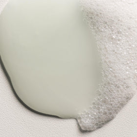 Davines MOMO shampoo in shower environment showing everyday usability and convenience