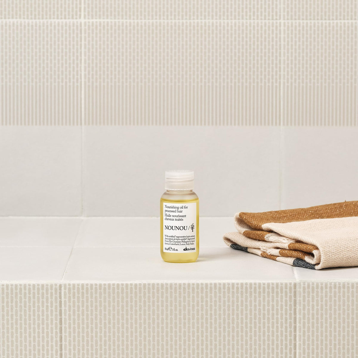 Davines NOUNOU before and after ends showing smoother, repaired-looking hair