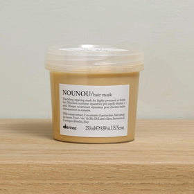 Davines open jar texture revealing creamy mask for deep repair