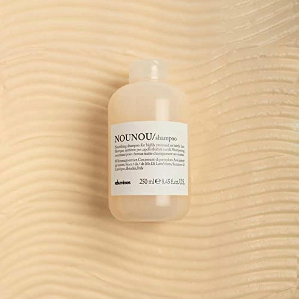 Davines product back label close-up showing ingredients and benefits