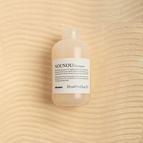 Davines product back label close-up showing ingredients and benefits