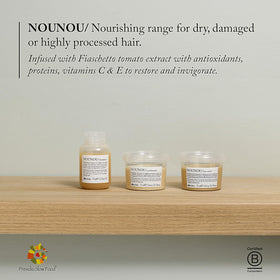 Davines NOUNOU travel size beside a passport illustrating portability benefit