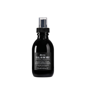Davines front packaging showing OI All In One Milk, travel-friendly and elegant