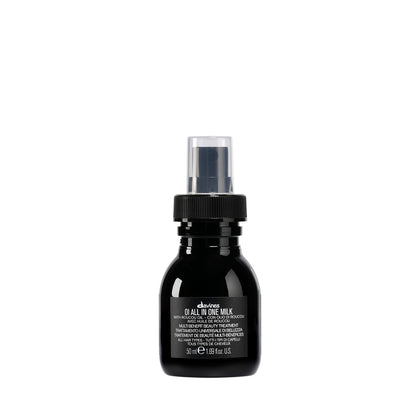 Davines OI front packaging shows compact leave-in spray and benefits