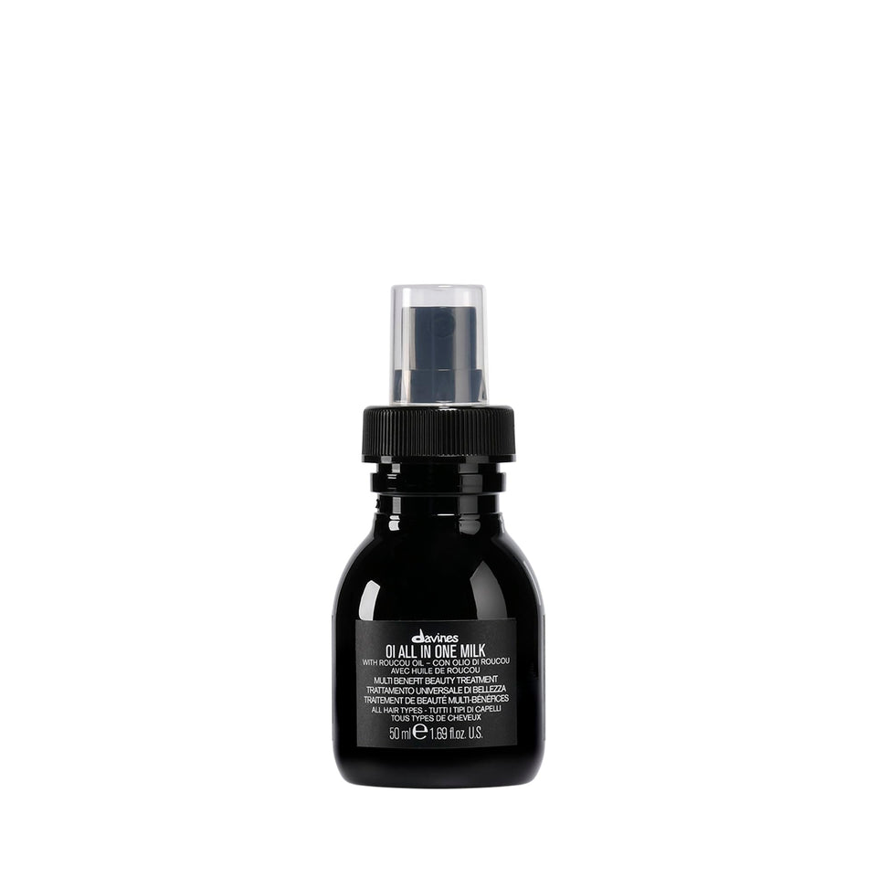 Davines OI front packaging shows compact leave-in spray and benefits