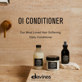 Davines OI conditioner back label with ingredient list and benefits