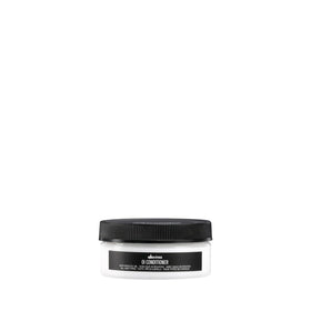 Davines front packaging showing compact conditioner and travel convenience
