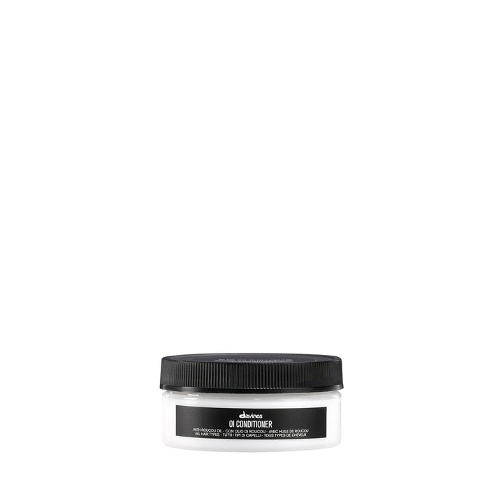 Davines front packaging showing compact conditioner and travel convenience
