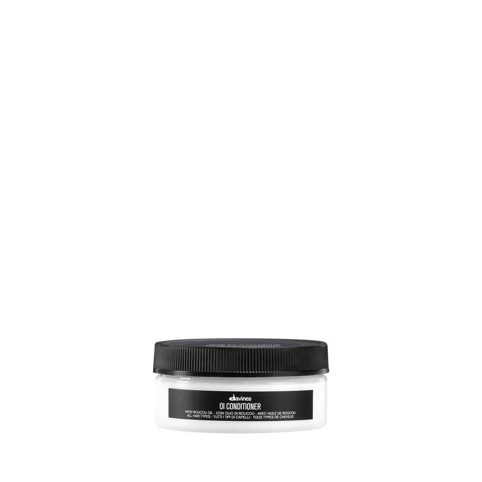 Davines front packaging showing compact conditioner and travel convenience