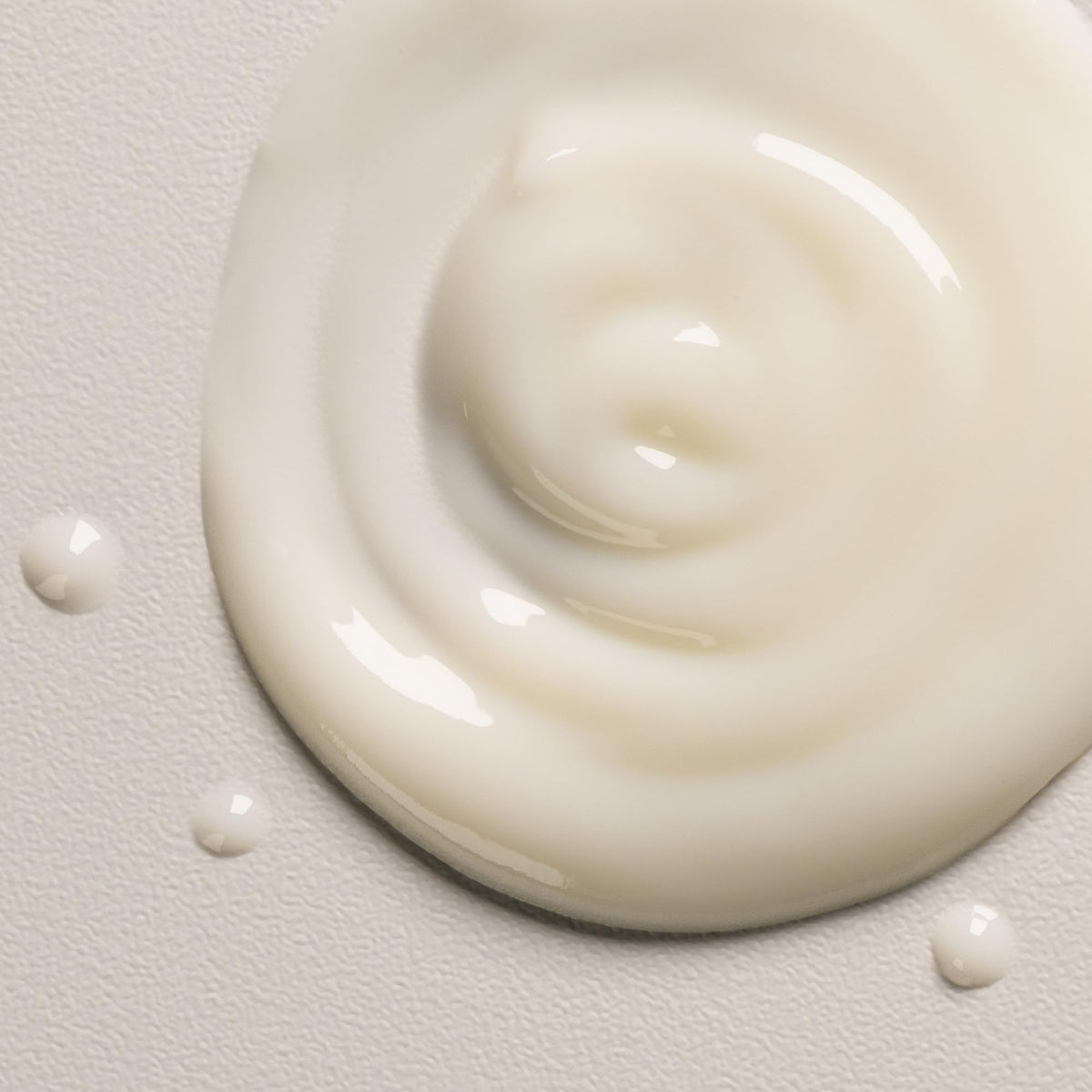 Davines OI ingredients label closeup showing roucou and sunflower oil