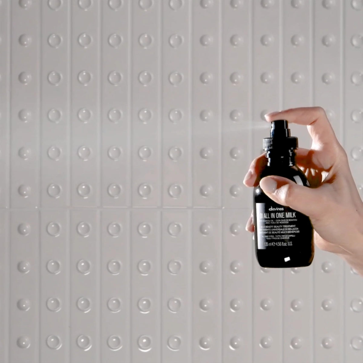 Davines OI set styled on bathroom vanity conveying salon-scented at-home ritual