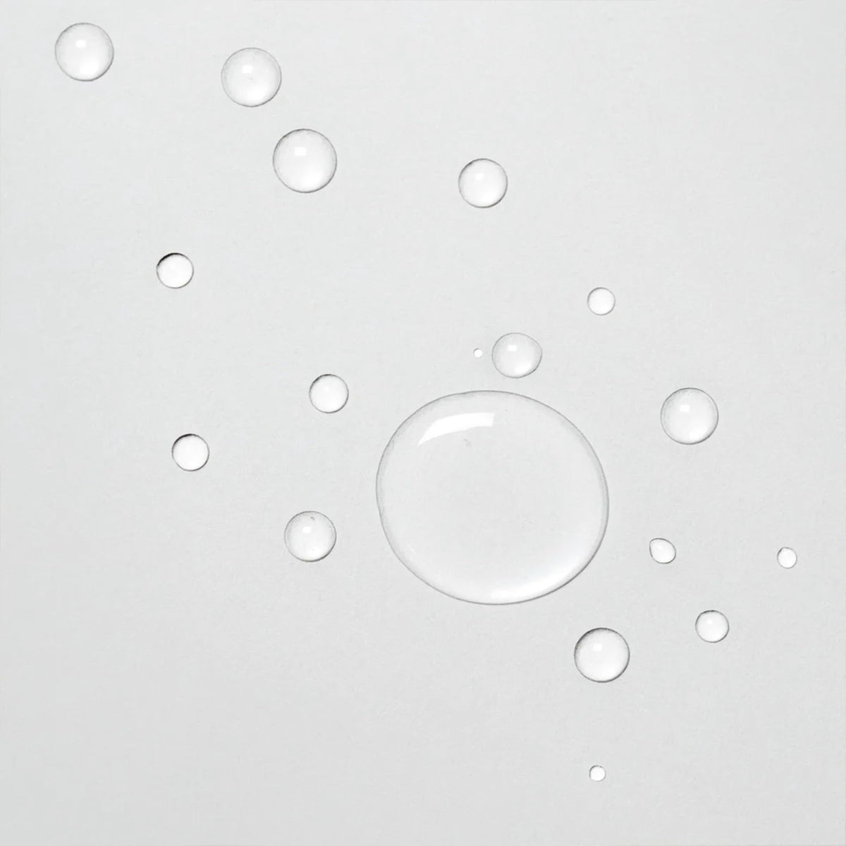 Davines OI Liquid Luster applied to wet hair showing instant detangling benefit