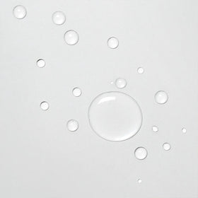 Davines OI Liquid Luster applied to wet hair showing instant detangling benefit