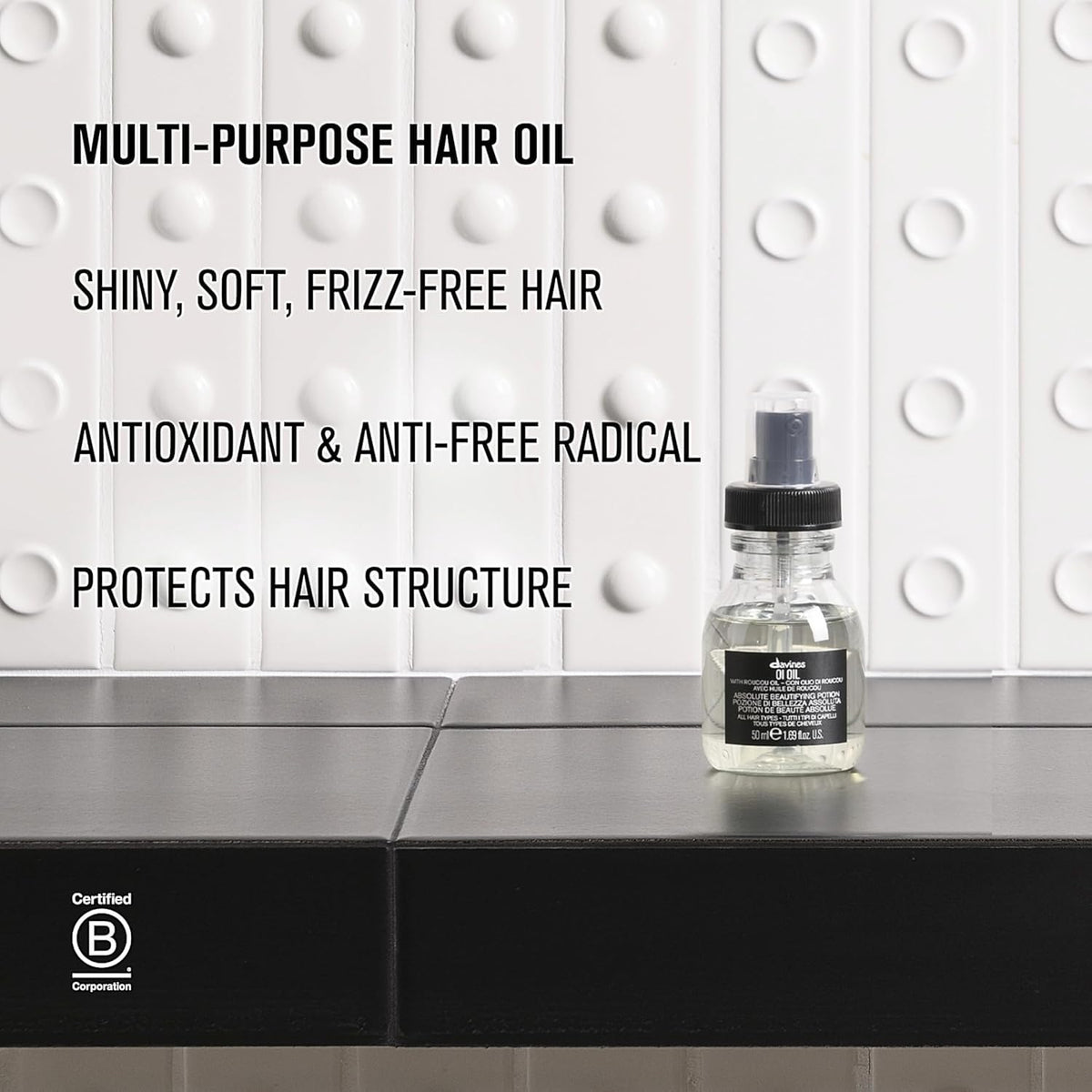 Davines OI Oil inside a toiletry bag demonstrating travel-friendly convenience