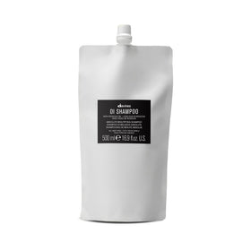 Davines OI Shampoo front packaging shows refill bottle and brand for economical use