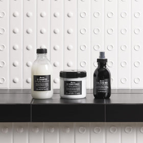 Davines OI Shampoo label with Roucou oil ingredient focus promoting antioxidant care
