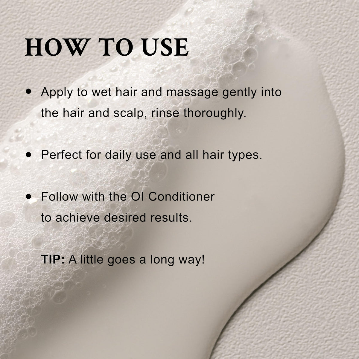 Davines OI Shampoo pouring into palm to show texture and easy application