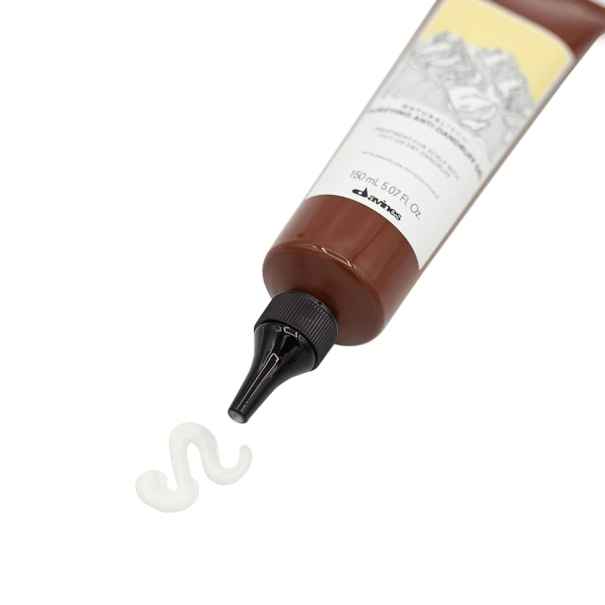 Davines Purifying Gel bottle next to ruler to show 5.07 fl oz scale