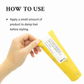 Davines fluid being applied to hair for smoother styling benefit