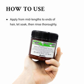 Davines applying Renewing Conditioning Treatment to wet hair for easier detangling