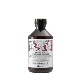 Davines replumping shampoo front bottle showing sleek packaging and brand quality