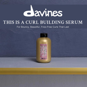 Davines serum texture on hand displaying lightweight spreadability benefit