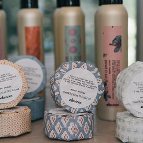 Davines close-up label highlighting Parma origin and quality benefit