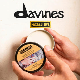 Davines jar open displaying dry matte clay texture for easy styling