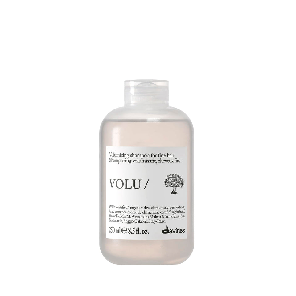 Davines VOLU/ front bottle showing product and volume benefit