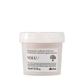 Davines VOLU/ front packaging showing bottle and cap, highlights volumizing benefit