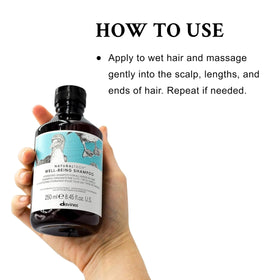 Davines shampoo lathered in hand to show easy distribution and cleansing