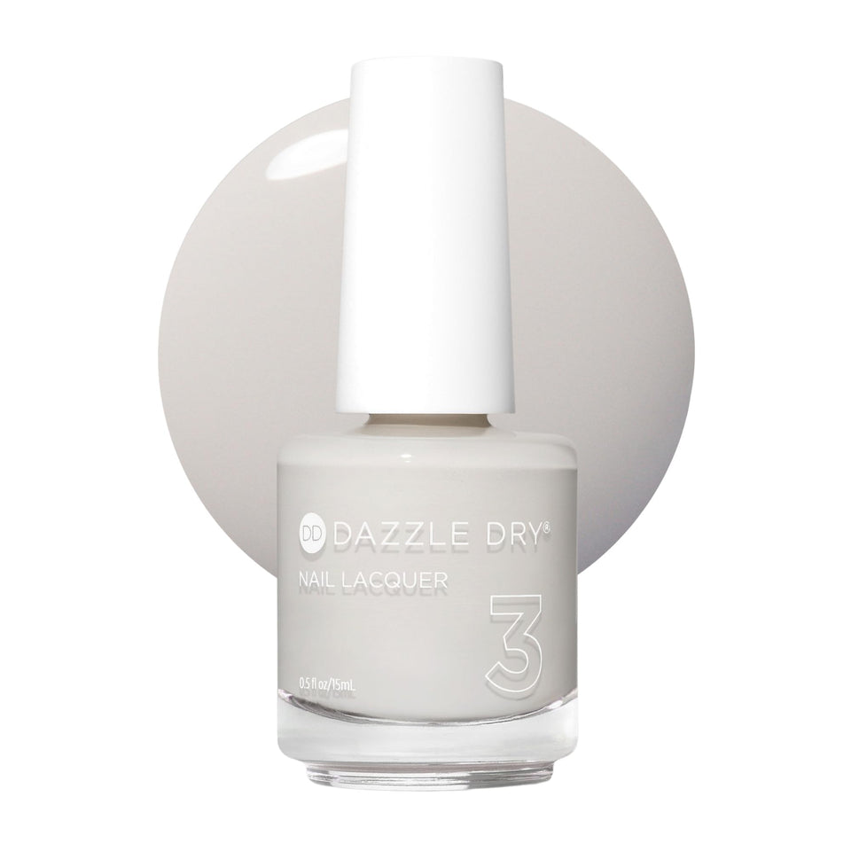Dazzle Dry front packaging showing warm bone white polish and brand clarity