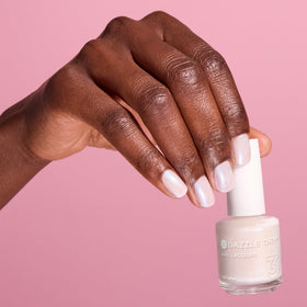 Dazzle Dry application on natural nails demonstrating smooth, quick-dry finish