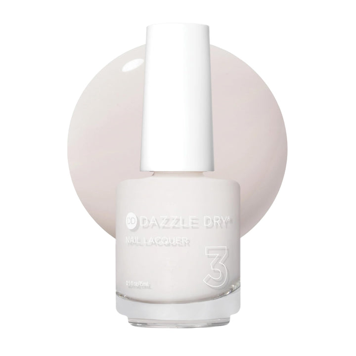 Dazzle Dry bottle front showing pale off-white cream shade and brand