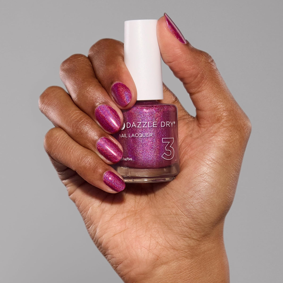 Dazzle Dry holographic sheen under light highlighting multidimensional sparkle