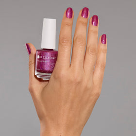 Dazzle Dry nail swatch on hand showing true dark fuchsia finish